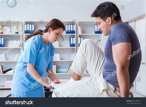 Doctor Patient During Checkup Injury Hospital Stock Photo