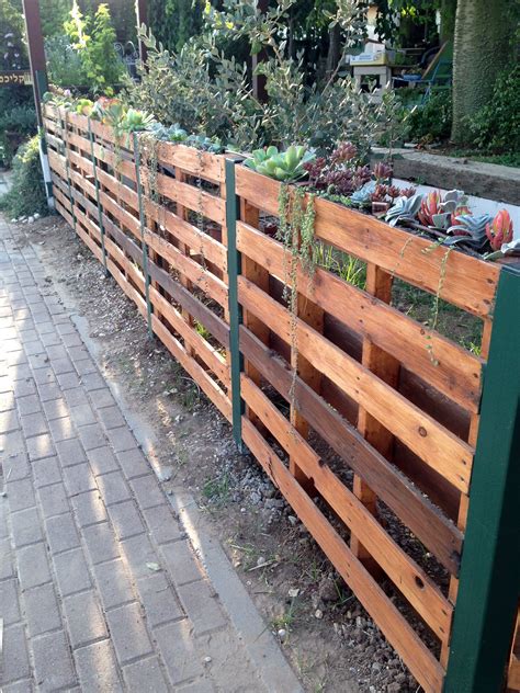 The diy experts at hgtv.com show you how to build a unique privacy fence to keep those nosy neighbors at bay. Image by Gadi Kalihman on Pallets succulent fence ...