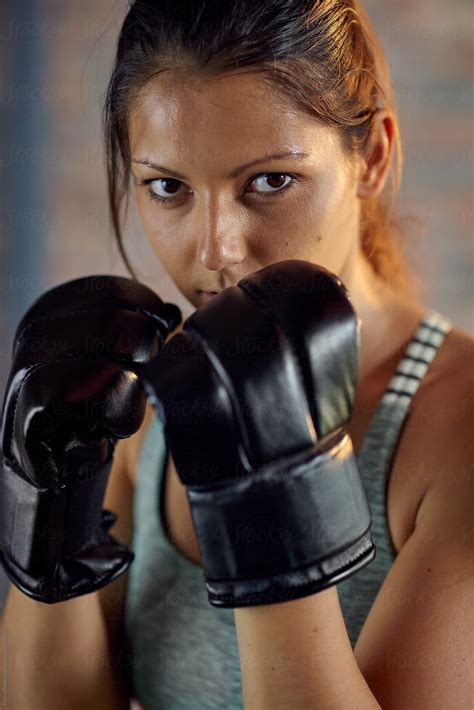 Fitness Muscular Lean Woman Boxer In Black Boxing Punching Gloves By Stocksy Contributor