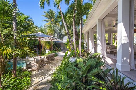 We offer a variety of construction work for your home. Lush, Tropical Backyard | HGTV