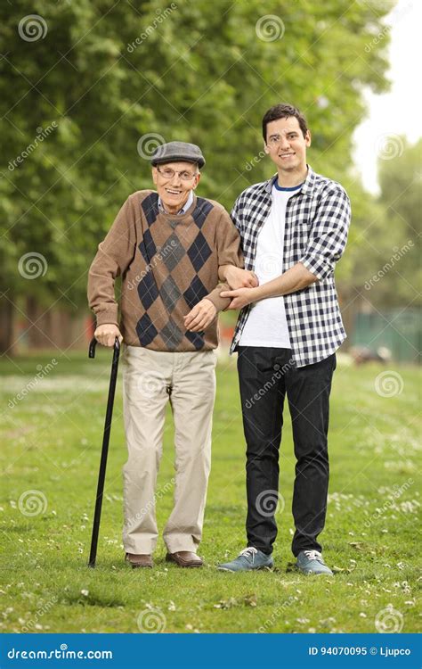 Grandson Helping His Grandfather In The Park Stock Image Image Of Expression Adult 94070095