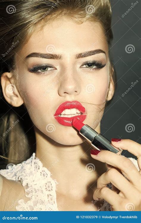 Girl Putting On Lipstick Stock Image Image Of Makeup 121032379