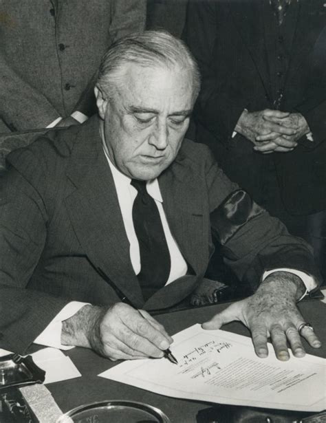 President Roosevelt Signs The Declaration Of War Against Japan White