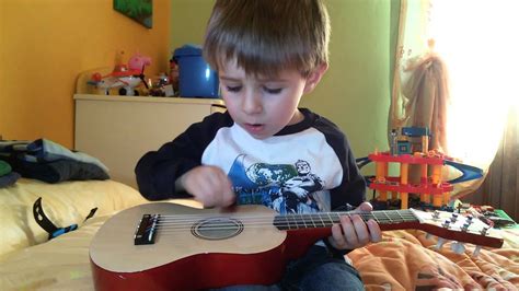 Baby Plays Guitar And Sings She Loves You Youtube