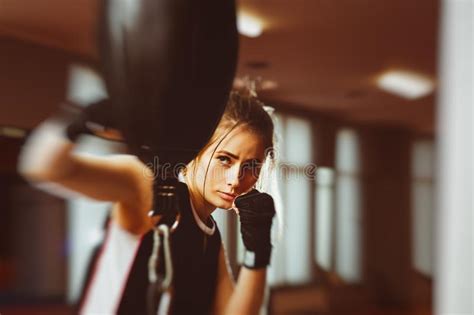 woman with black boxing wraps on hands boxing in ring active gi stock image image of active
