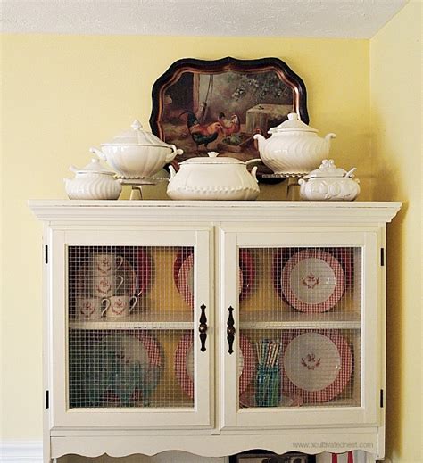 Allow it to dry between coats. Dining Room China Cabinet Makeover - A Cultivated Nest