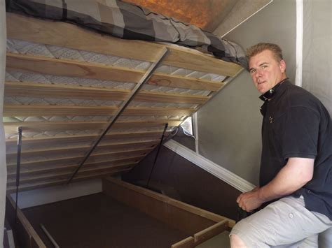 Gas struts for bed lift. Ample storage under the bed ...easily accessed with a ...