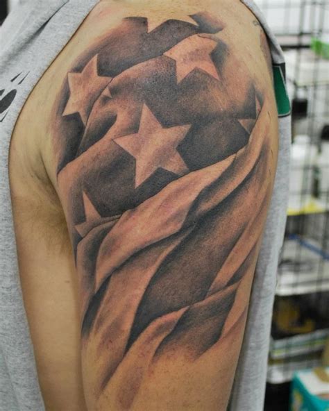 Nothing can be better than american flag tattoos to show your love for your county. freehand flag tattoo | Flag tattoo, Star tattoos for men ...