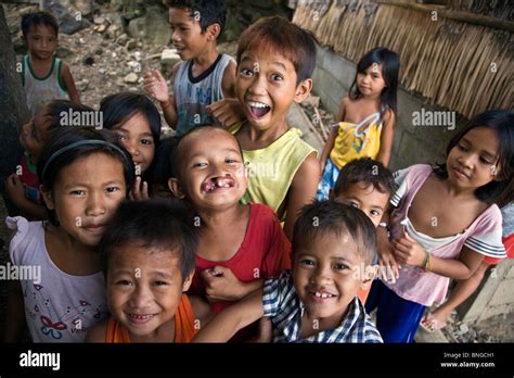 Smiling Filipino Children In A Small Fishing Village North Of El Nido