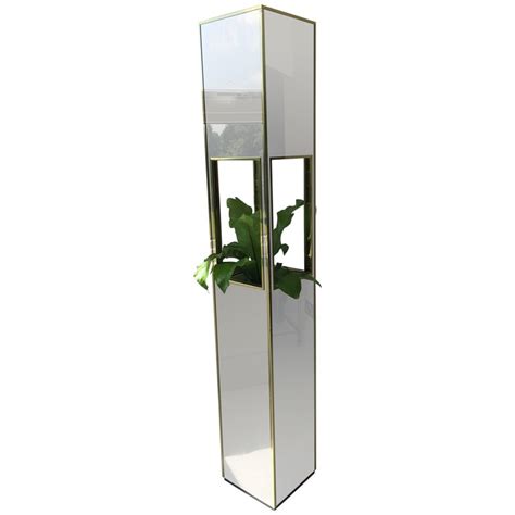 Illuminated pedestal stand or lamp, rendered in mirror polished stainless steel and frosted glass diffuser, designed by. 1970s Smoked Mirrored Pedestal Lamp and Plant Stand For ...