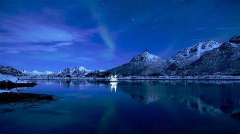 Download Wallpaper 1600x900 Mountains Lake Boat Ice Sunset Starry