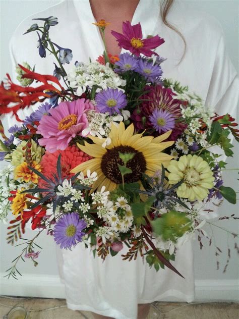 There's something so romantic about these garden wedding venues. sunflower, cosmos, zinnia, aster, fresh from the garden | Wedding flowers, Wedding bouquets, Flowers