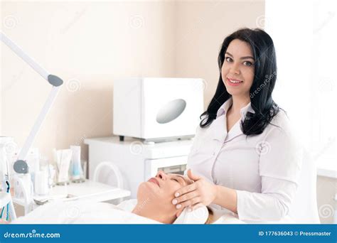 Cosmetologist Making Facial Massage To Client Stock Image Image Of Technology Confidence