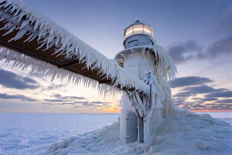 The Lighthouse In St Joseph Michigan Covered In Ice On January 8