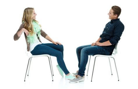 Two Smiling People Sitting On Chair Stock Photo Download