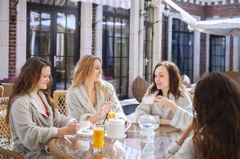 Four Young Women Drinking Tea Spa Resort Stock Photos Free And Royalty