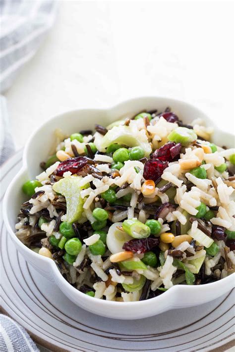 Toss wild rice, basmati rice, dill, parsley, pistachios, oil, lemon zest and juice, lime powder, and fava beans in a large bowl; Wild Rice Salad | Recipe | Wild rice salad, Wild rice ...