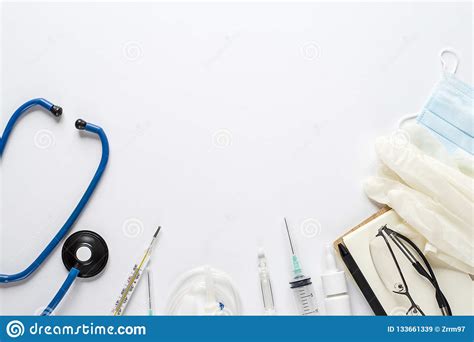 Various Medical Equipment And Notepad On White Background The View