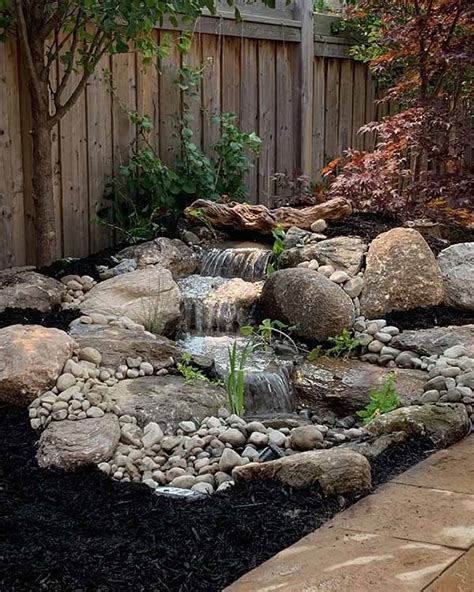 17 Cool Pondless Disappearing Waterfalls For Your Backyard