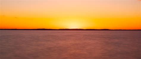 Download Wallpaper 2560x1080 Sea Sunset Horizon Blur Long Exposure