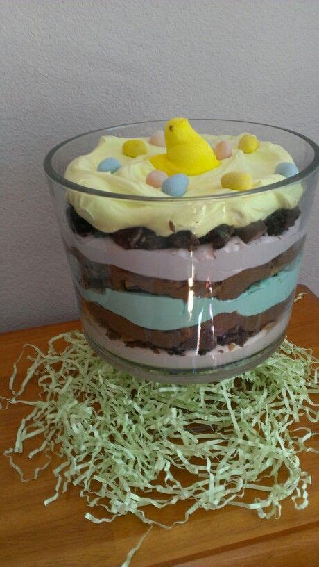 It's a colorful mix of cake, cool whip and pudding, then topped with edible easter decor. Easter Trifle layers of colored cool whip, brownie pieces, pieces of heath bar and chocolate ...