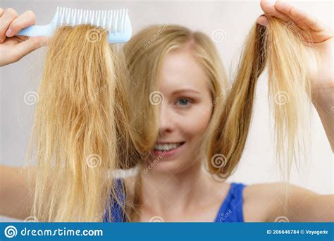 Woman Combing Long Blonde Hair Stock Photo Image Of Long Combing