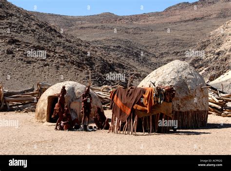 Two Houses In Himba Village Kaokoveld Namibia Southern Africa Stock