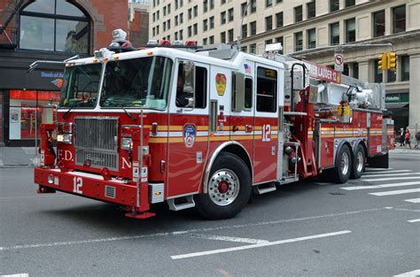 It is missing one black fire hose on the drivers side rear. FDNY TL12 | Fdny, Fire trucks, Emergency vehicles