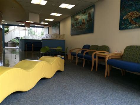 Dining room (used as kids movie area). Kid friendly waiting room with an area separate for sick ...