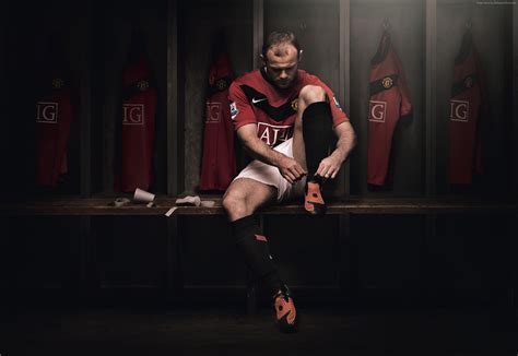 Soccer Player Wearing Red And Black Crew Neck T Shirt And White Shorts