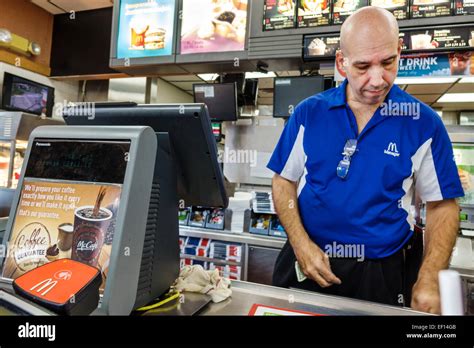 Miami Florida McDonald's restaurant fast food counter man employee