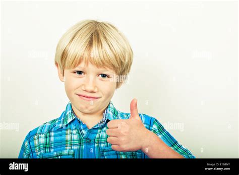Happy Child With Thumbs Up Stock Photo Alamy
