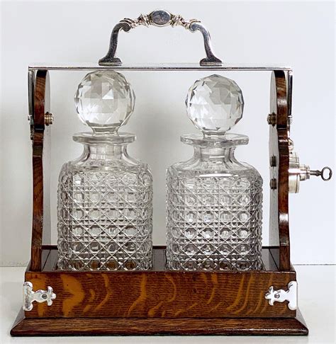 English Oak And Silver Tantalus Or Decanter Drinks Set By Betjemann S At 1stdibs Tantalus