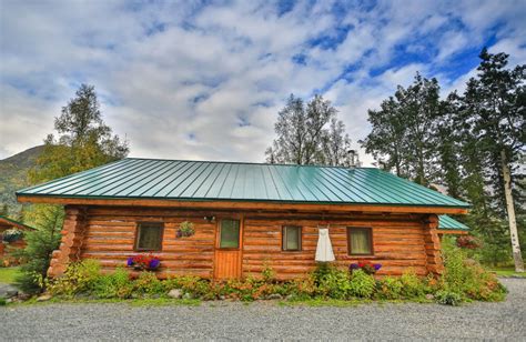 Small deck and huge windows bring that view inside! Alaska Heavenly Lodge (Cooper Landing, AK) - Resort ...