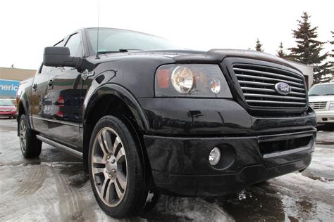 These images show some details that the front side window appears to be a flat bottom. 2007 Ford F150 Harley Davidson Crew Cab - Envision Auto