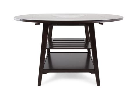 A white dining table in a distressed style looks great in a shabby chic home, while a black dining table looks modern and formal. Winners Only Parkside Round 2 Square Drop Leaf Table With ...