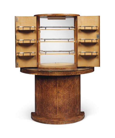 You also don't want it to break the bank. AN ART DECO BURR-WALNUT AND SATIN BIRCH COCKTAIL CABINET ...