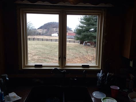 This awning over the kitchen sink is a perfect choice for a great outdoor view and ventilation even during a summer rain. Pella Proline Casement windows make opening your kitchen ...