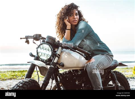Beautiful Female Biker Driving A Cafe Racer Motorbike Pretty Girl