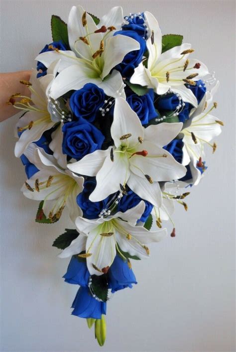 We did not find results for: Teardrop Wedding Bouquet, Ivory lillies, Royal Blue Roses ...