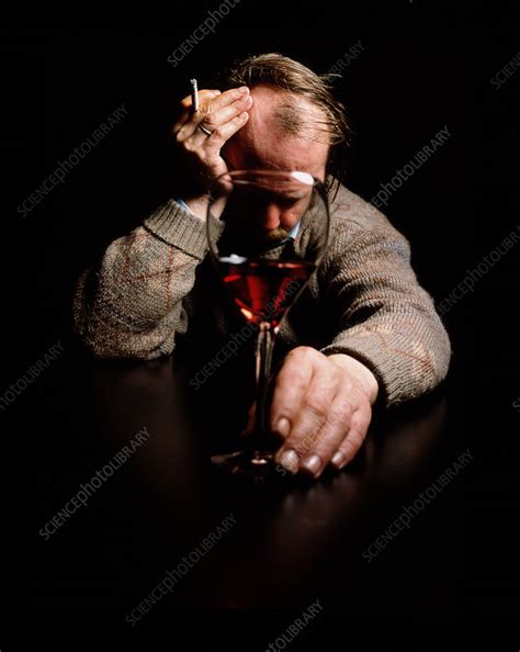 Depressed Man With Cigarette And Alcohol Stock Image M3700382