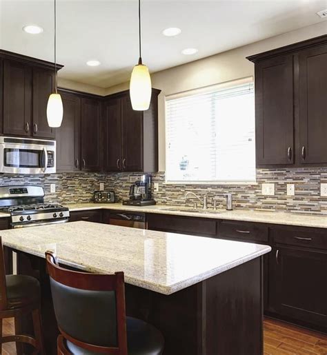 You had to see this one coming…painting your oak cabinets is a great way to update and modernize them. 30 Inspiring Kitchen Remodel Ideas for Busy Homeowners | Brown kitchen cabinets, Kitchen design ...