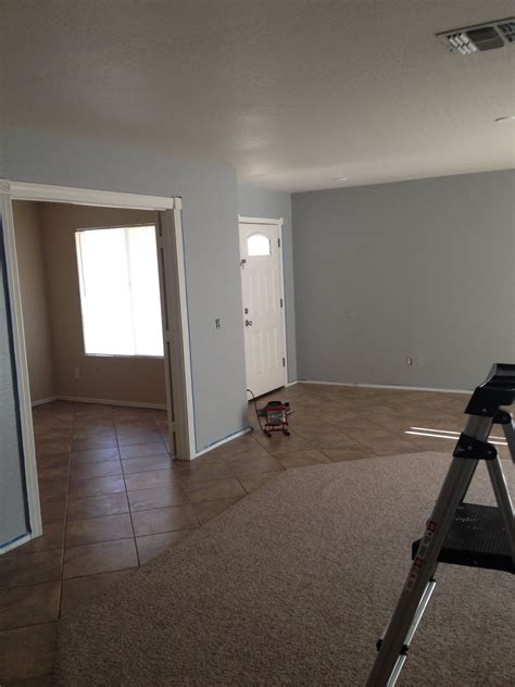 Gray paint colors are particularly versatile because of their wide range of undertones. Valspar - "Urban Sunrise" blue-gray paint color in living ...
