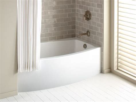 It serves as the best right hand drain alcove bathtub with modern look. The Bold Look of | Grey tiles, Alcove and Glass doors