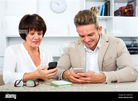 Mother And Son With Smartphones Stock Photo Alamy