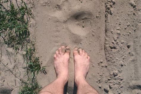 Mans Barefooted Feet Walk On Dry Sand By The River On Beach Stock Image Image Of Textured