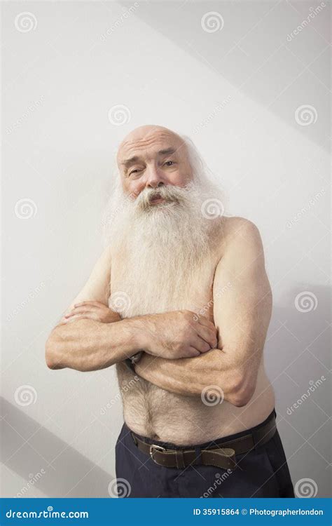 Portrait Of Shirtless Senior Man With Arms Crossed Over White Background Stock Photo Image Of
