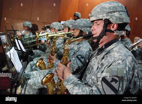 Us Army Soldiers From The 1st Cavalry Division Band Perform During A