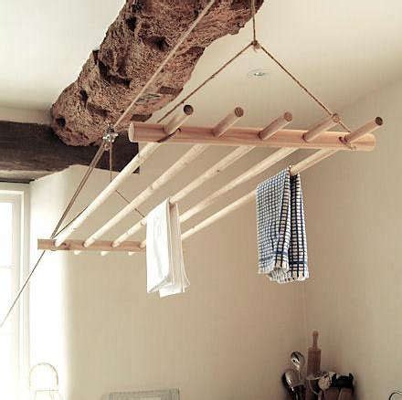 This wall mount drying rack holds up to 20 pounds and slips right back into its storage spot when you're done with it. Ceiling Clothes Dryer