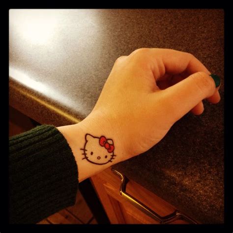 Hello Kitty Bow Tattoos On Finger